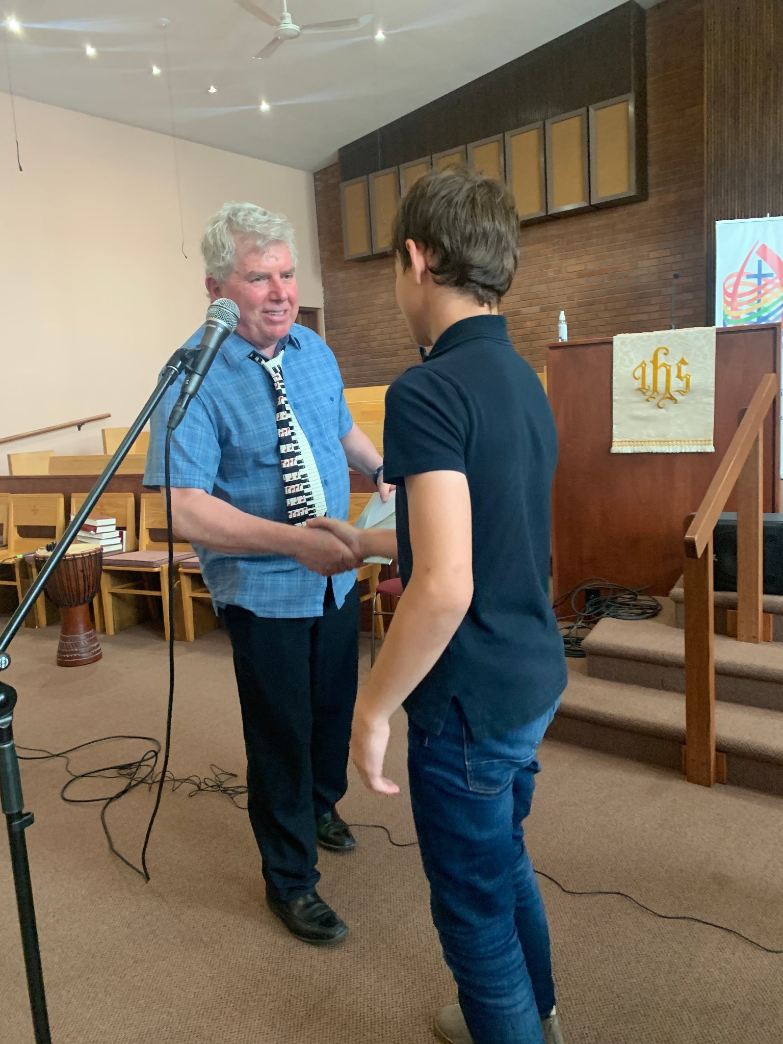 Jim teaching piano